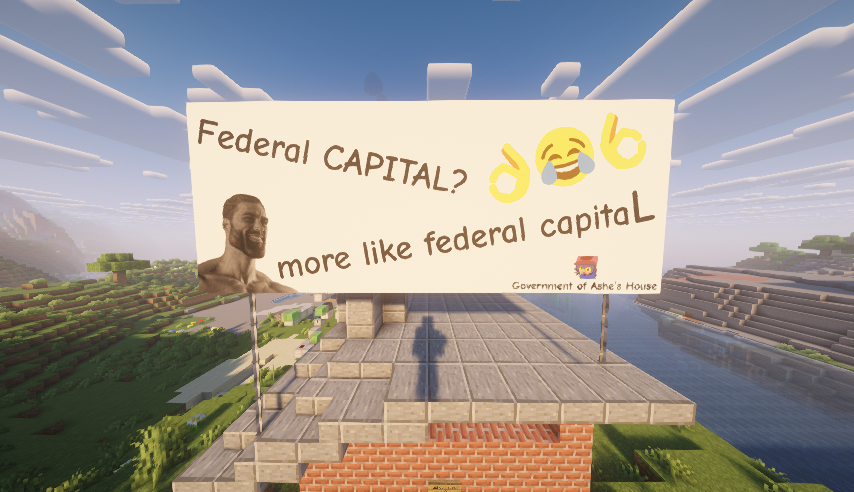 A billboard reading ‘Federal CAPITAL? more like federal capitaL’